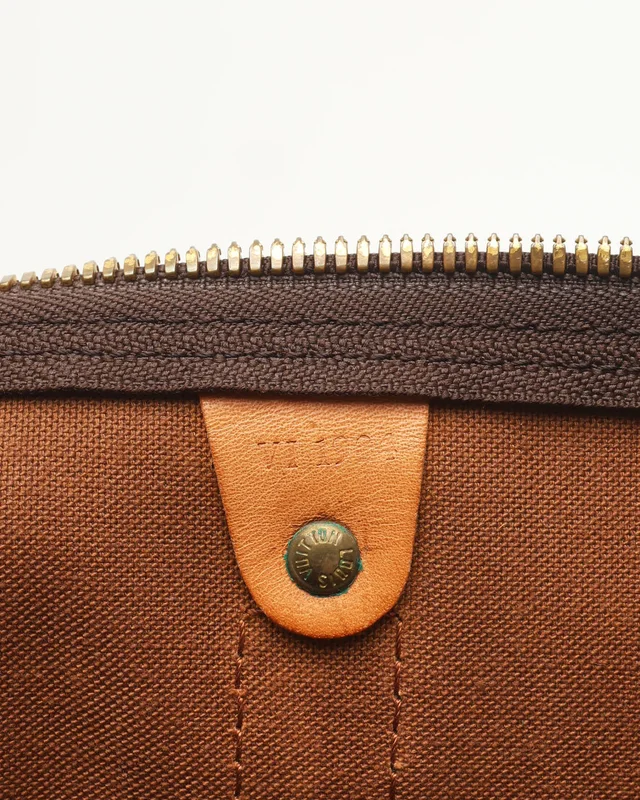 Louis Vuitton Monogram Keepall Bandoulière 60 Weekend Bag in Coated canvas from A Retro Tale, photo 10 of 11
