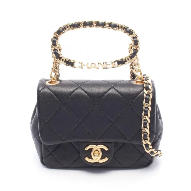 Chanel Shoulder Bag Mini Quilted Top Handle Black Lambskin Chain in Black Lambskin from The Reluxe