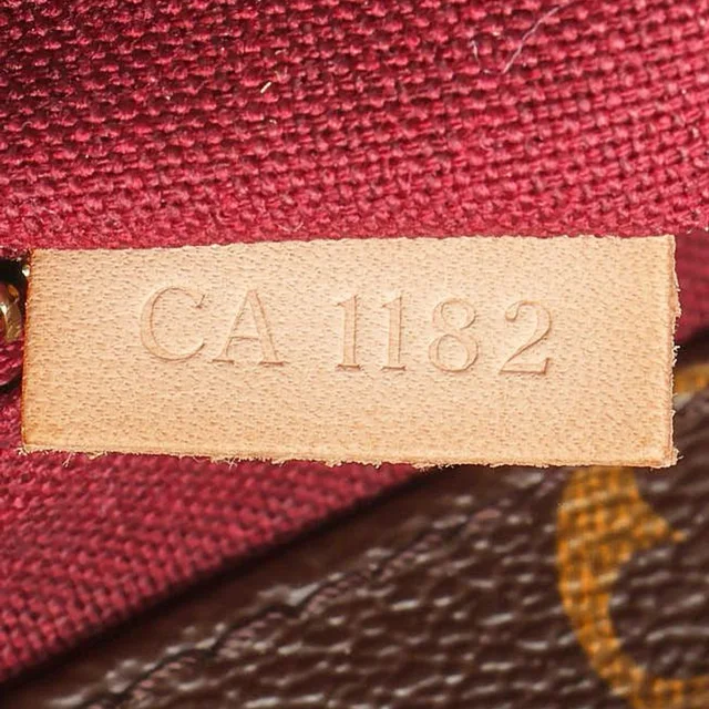 Louis Vuitton Monogram Raspail PM Tote Bag in Coated canvas from A Retro Tale, photo 9 of 10