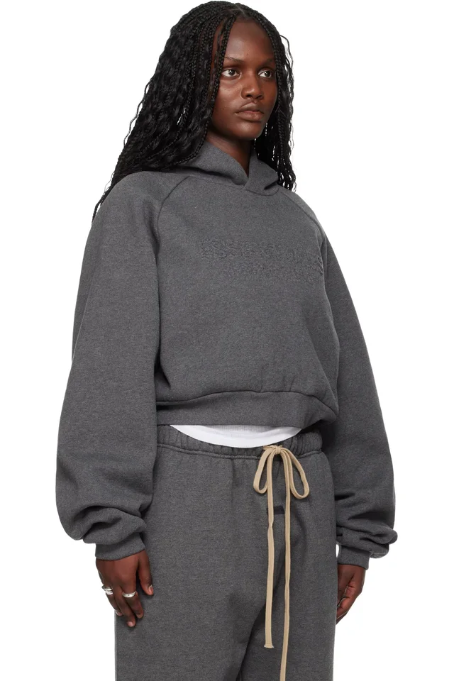 Fear of God ESSENTIALS Gray Holiday Embossed 90s Raglan Hoodie, photo 2 of 4 from SSENSE