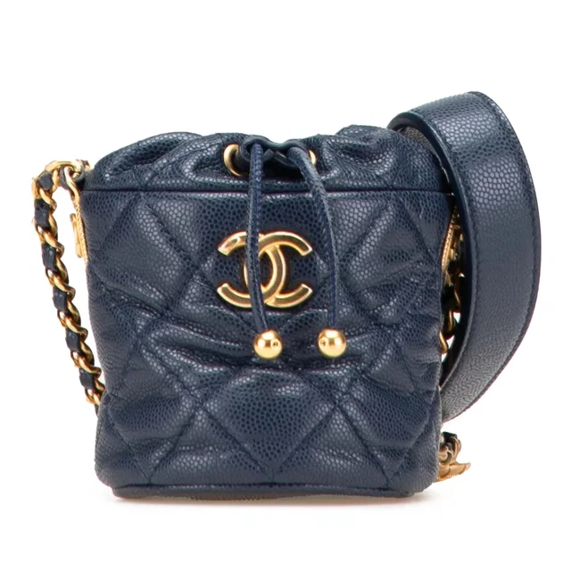 Blue Chanel Mini Quilted Caviar Medallion Charms Drawstring Bucket Bag in Blue Caviar leather from Designer Revival, photo 1 of 1