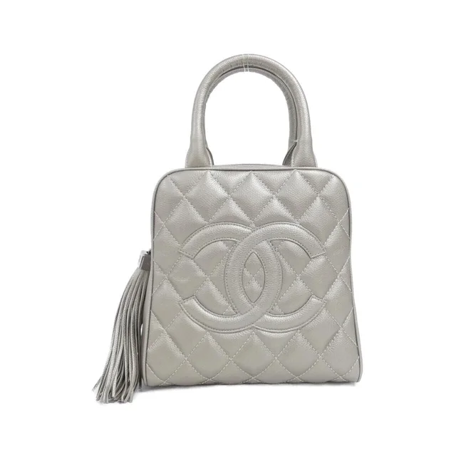 Chanel Bag Handbag Silver in Silver Caviar leather from The Reluxe