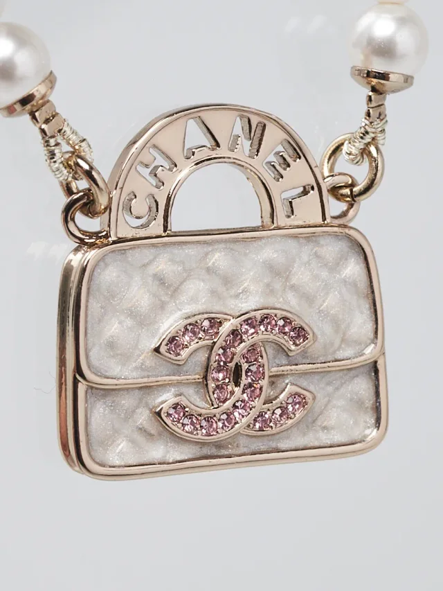 Chanel Gold Metal Faux Pearl and Chain Flap Bag Necklace in Gold from Yoogis, photo 2 of 6