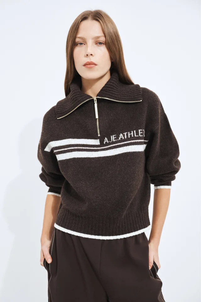 Athletica 1/4 Zip Stripe Logo Knit in White from Aje, photo 1 of 1
