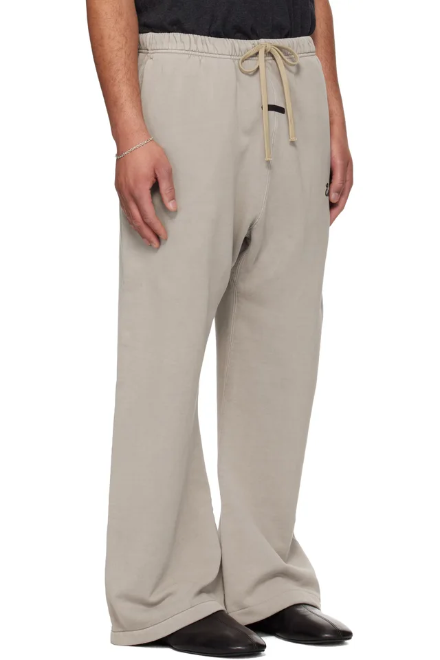 Fear of God ESSENTIALS Taupe Training Classic Flare Sweatpants, photo 2 of 4 from SSENSE
