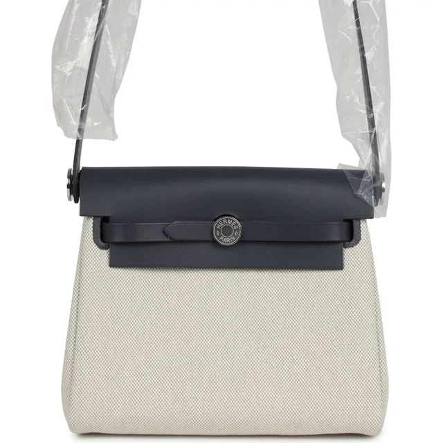 Hermès Herbag Zip 20 Mini Ecru and Bleu Glacier Toile H Canvas and Ardoise Vache Hunter Palladium… in Blue Canvas from Madison Avenue Couture