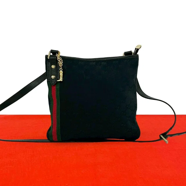 Gucci Sherry Line GG Canvas Pattern Shoulder Bag Pochette Crossbody Black in Black Canvas from The Reluxe