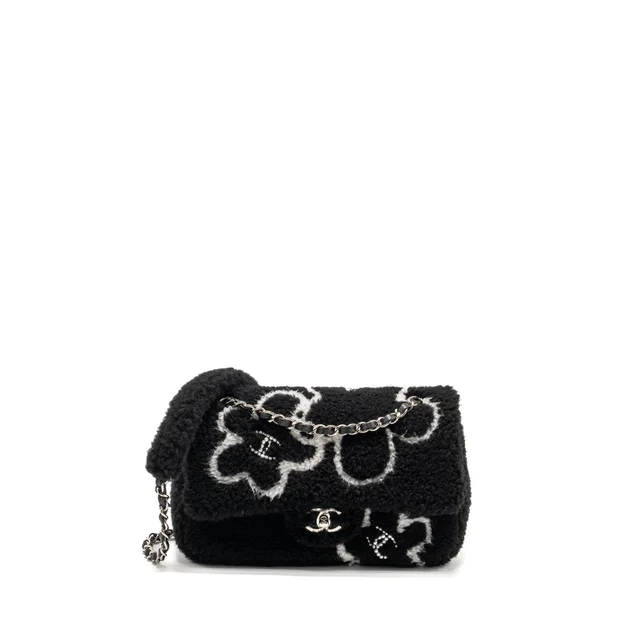Chanel 22A Fluffy Camellia Flap Bag Embroidered Shearling Lambskin Black / White SHW (Microchip) in Black Lambskin from EMIER