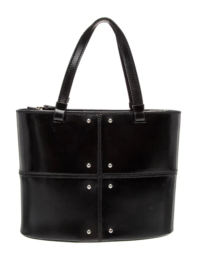 Tod's Top Handle handbags in black Leather from The RealReal