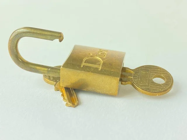 Dior Gold Padlock and Key Set in Gold from Bagriculture