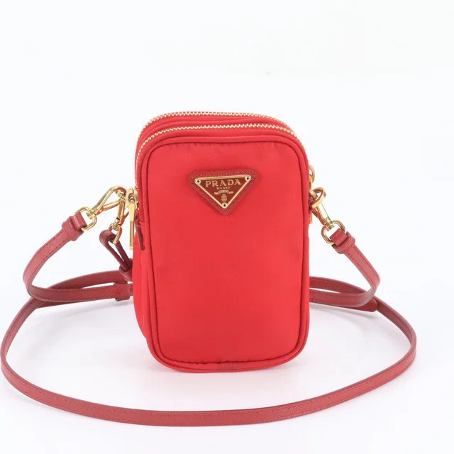 Prada Tessuto Nylon Triangle Logo Leather Shoulder Bag Crossbody in Nylon from The Reluxe