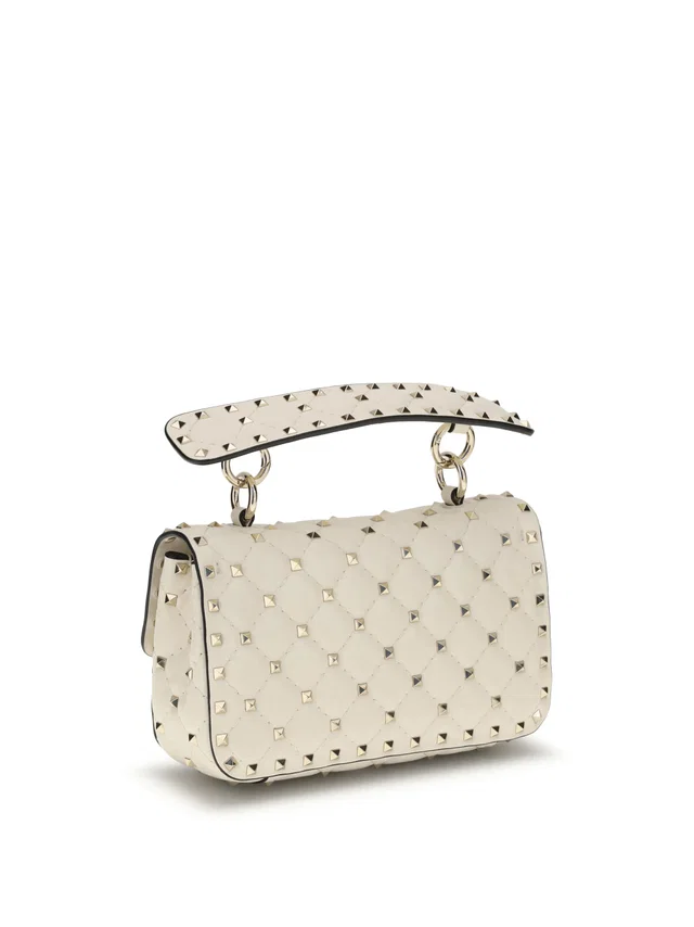 Valentino Garavani Rockstud Spike Top Handle Bag — Beige Lambskin in Beige Lambskin from HEWI