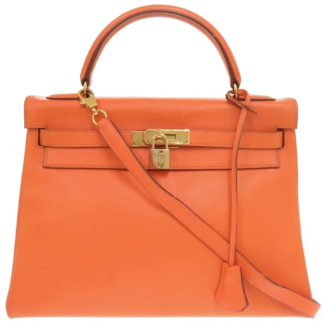 Hermès Kelly 32 Retourne Voga River Orange Gold Handbag in Orange from The Reluxe