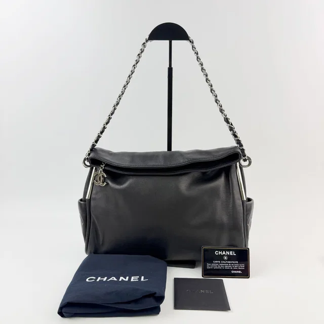 Chanel CC Logo Side Pocket Charm Chain Shoulder Bag Leather Black Silver Seal in Black Leather from The Reluxe