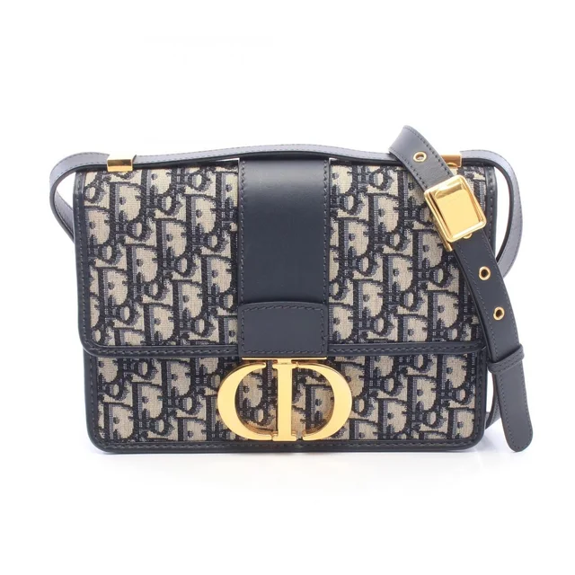 Dior Shoulder Bag 30 Montaigne Navy Ivory Canvas Leather Oblique in White Canvas from The Reluxe