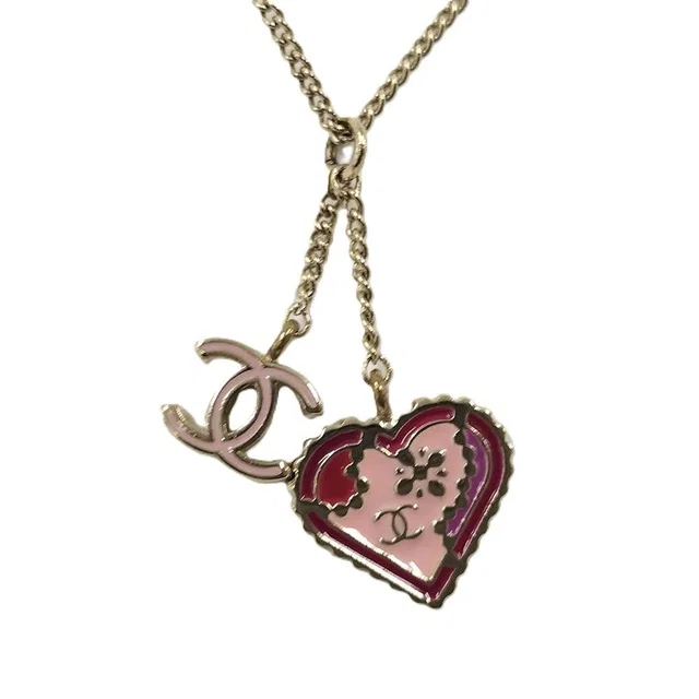 Chanel 05P Necklace Heart CC Logo Silver in Silver from The Reluxe