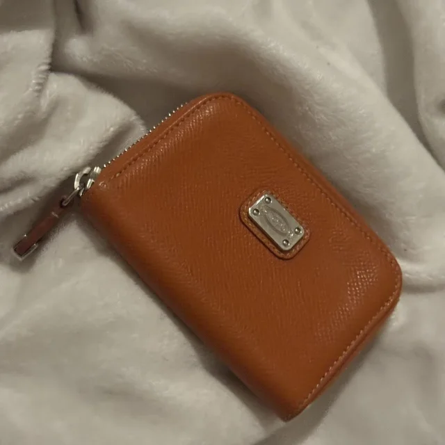 Tods Women's Coin purses and pouches - Orange/Brown in orange|brown|red Saffiano leather from Depop, photo 1 of 1