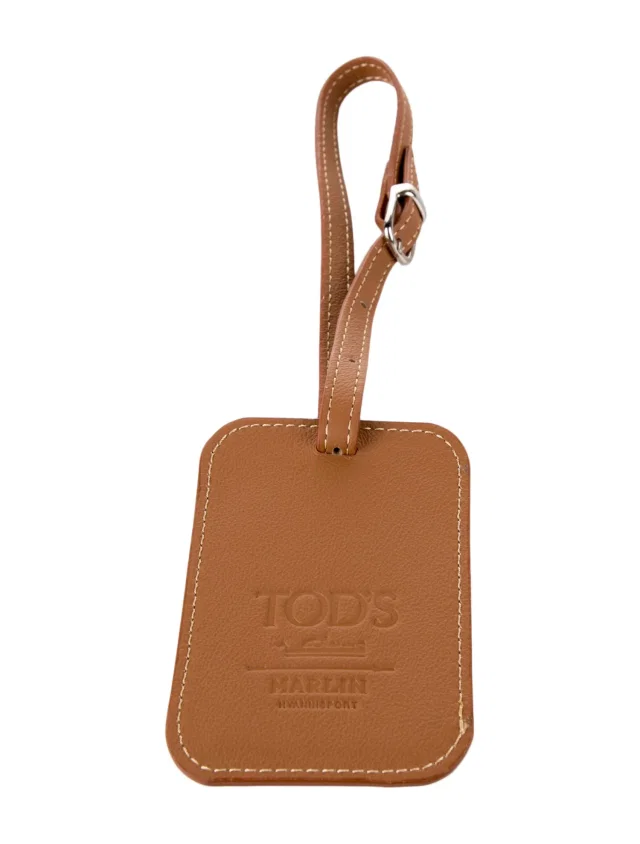 Tod's Leather Luggage Tag in brown|red Leather from The RealReal