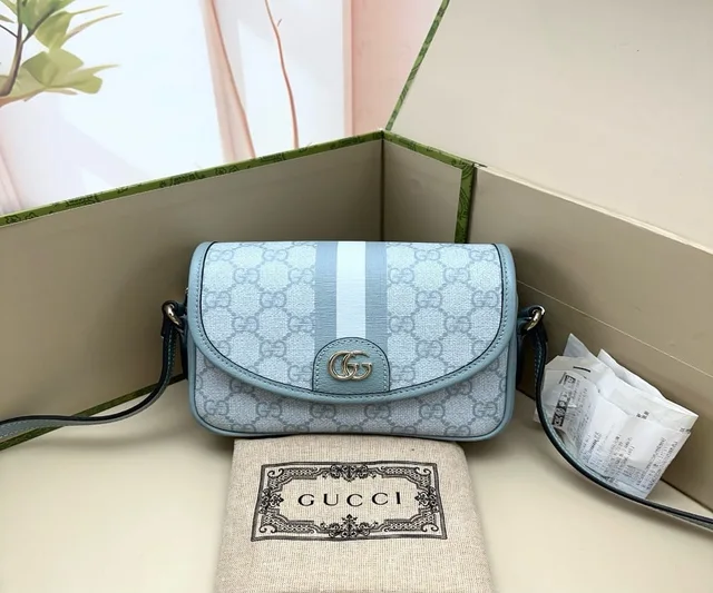 Gucci Light Blue GG Supreme Ophidia Shoulder Bag in Blue from Luxury Promise
