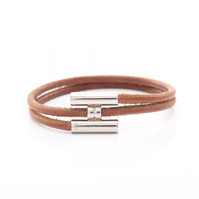 Hermès Bracelet Tourni Tresse Leather Stainless Steel in Leather from The Reluxe