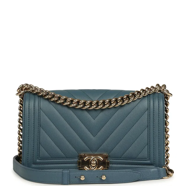 Chanel Medium Chevron Boy Bag Blue Caviar Light Gold Hardware in Blue Caviar leather from Madison Avenue Couture