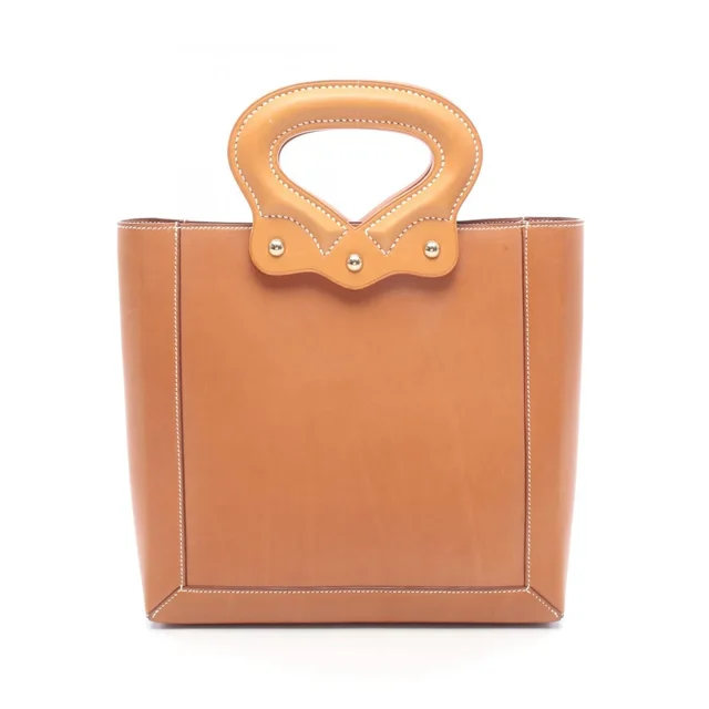 Hermès Handbag Vintage Handle Bag Natural Leather in Beige Leather from The Reluxe