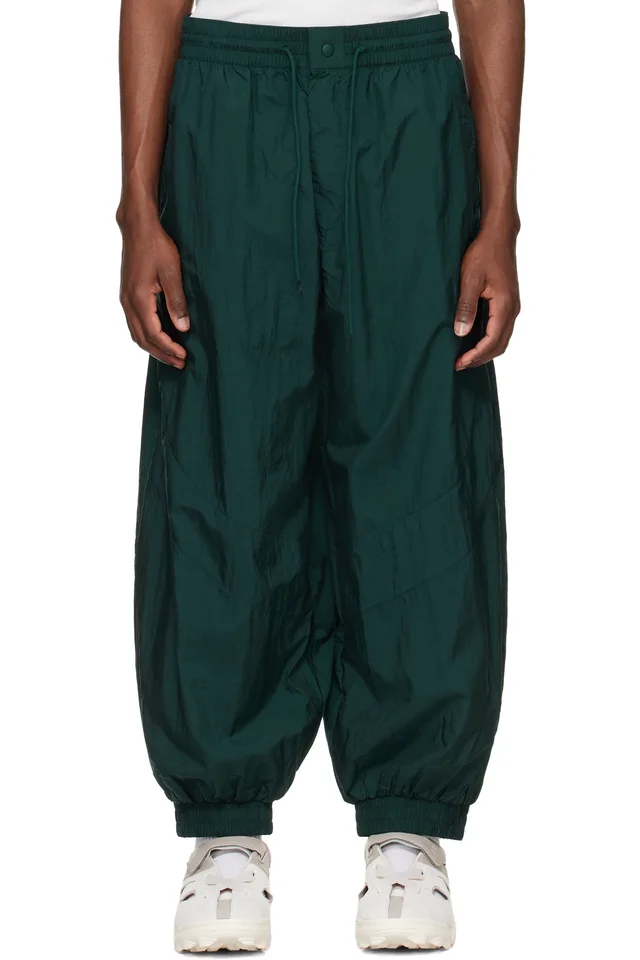 Green Raw Edge 3 Stripes Nylon Shell Track Pants, image 1 of 1 from SSENSE