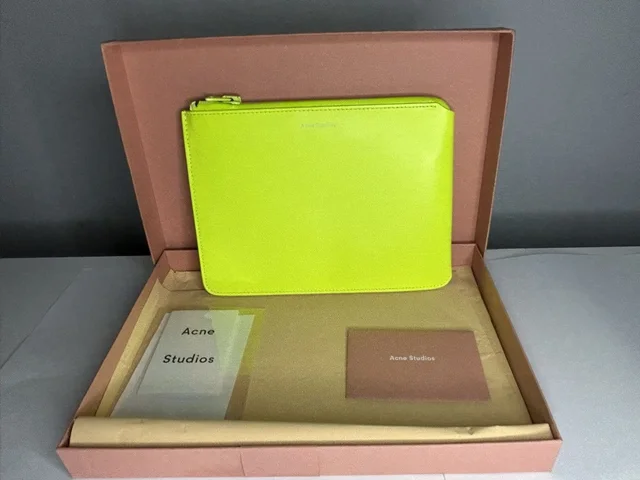 Neon Yellow Acne Clutch in yellow from Grailed