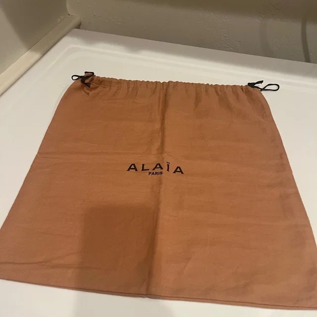 Alaïa Dust Bag in neutral|brown from Poshmark