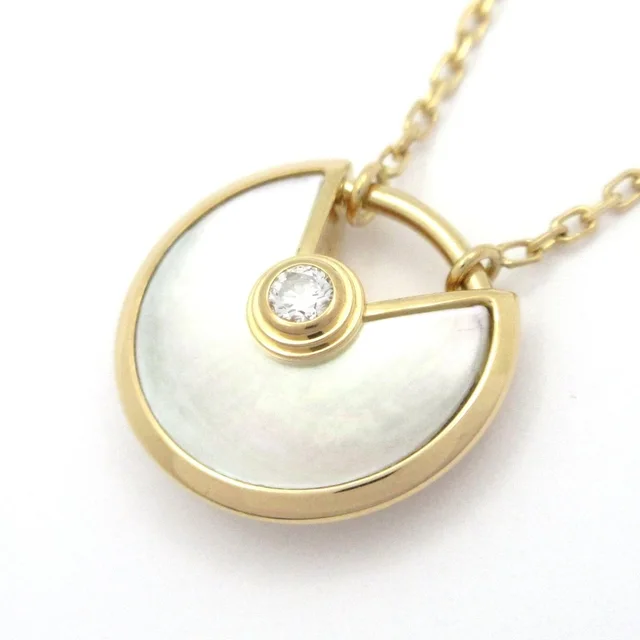 Necklace Amulette de Cartier XS 18k Yellow Gold White Mother of Pearl in White from The Reluxe