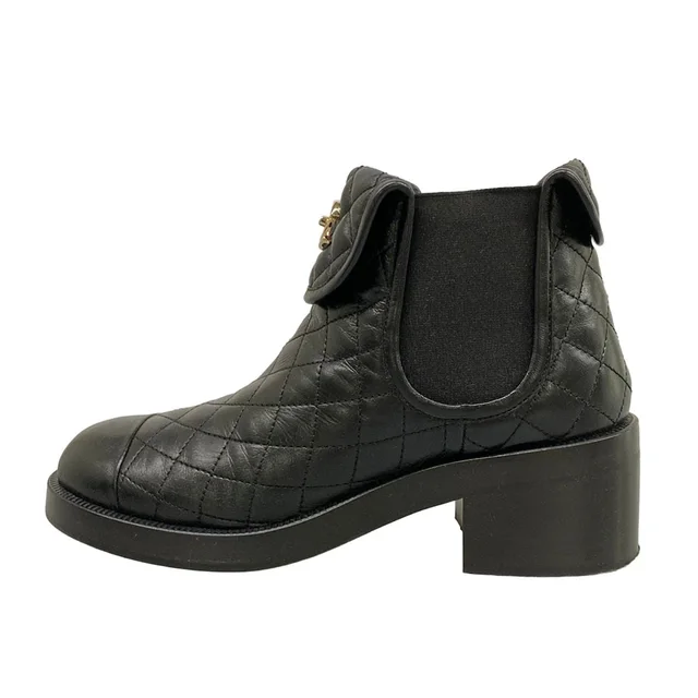 Chanel 23B Short Boots Black Quilted CC Logo Side Gore Lambskin in Black Lambskin from The Reluxe