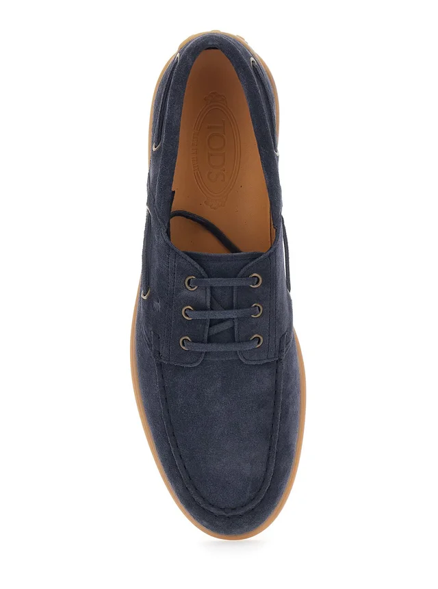 Tod's Blue Boat Loafers with Logo Lettering on Back in Suede Man in Blue 100% Calf, photo 7 of 7 from Gaudenzi Boutique