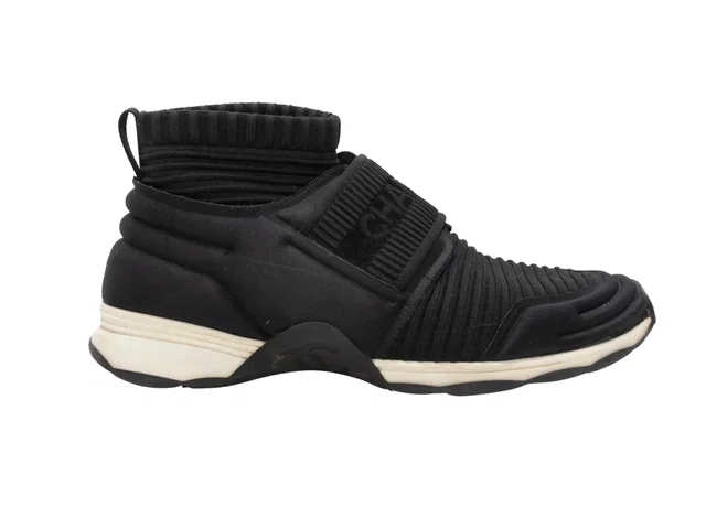 Black & White Chanel High-Top Slip-On Sneakers Size 38.5 in Black from Designer Revival
