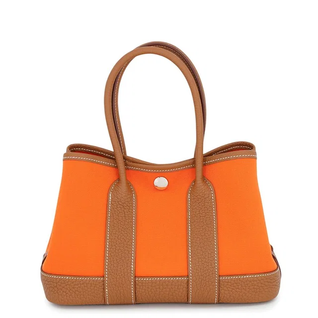 Hermès Tote Bag Neo Garden 23 Party Foo Gold Silver Toile Office Negonda in Gold from The Reluxe
