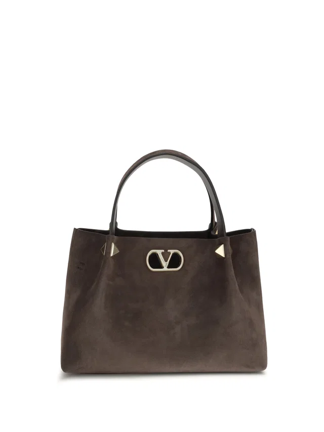 Valentino Garavani Suede With Studded Vlogo Top Handle Bag — Brown Calf Leather Bos Taurus in Brown Calfskin from HEWI