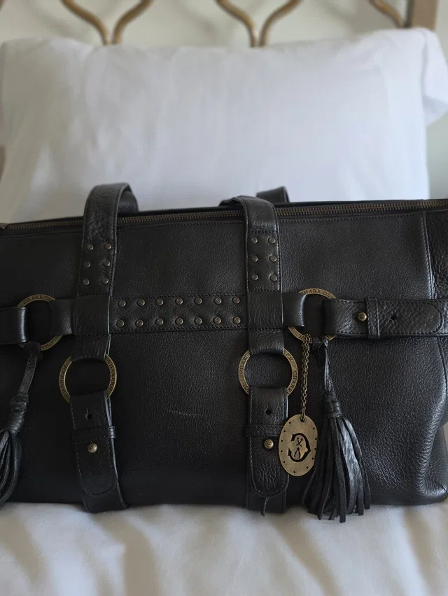 Charriol handbags in black from Poshmark