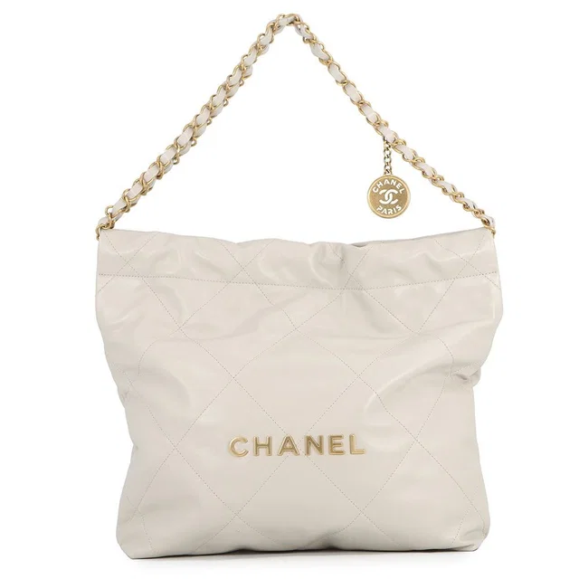 Chanel Handbag 22 Quilted Small Shiny Calfskin in Calfskin from The Reluxe