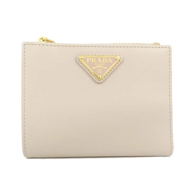 Prada Wallet Gold in Gold from The Reluxe