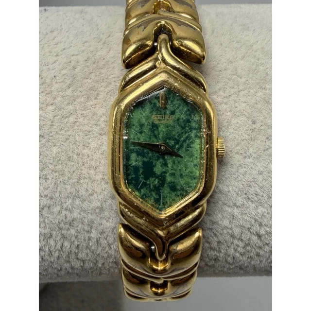 Seiko 4n00-6481 Vintage New Battery Ladies Watch 15mm 7" Green Dial in green from Poshmark