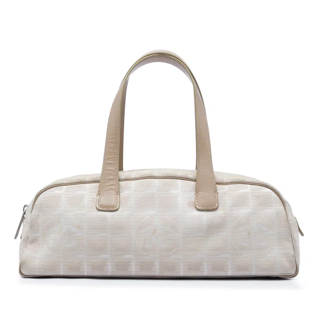 Beige Chanel New Travel Line Nylon Handbag in Beige Nylon from Designer Revival