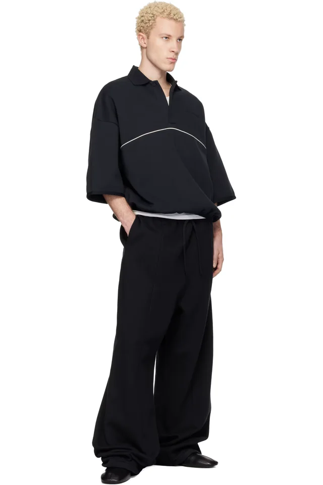 Fear of God ESSENTIALS Black Active Trace 3/4 Sleeve Modern Polo, photo 4 of 4 from SSENSE
