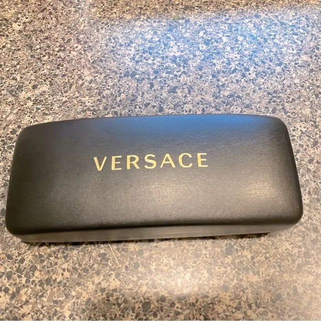Versace Hard Shell Sunglasses Clamshell Black Case in black from Poshmark