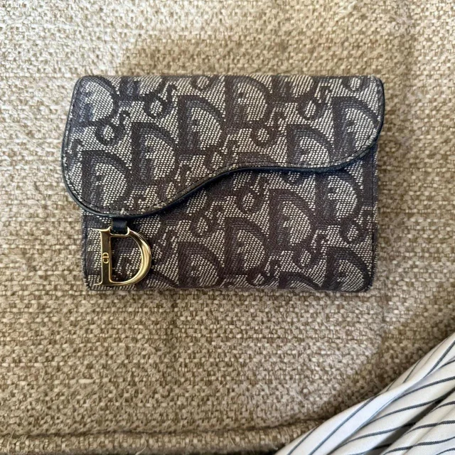 Dior Women's Wallets - Blue/Gold in gold|blue from Depop, photo 1 of 1