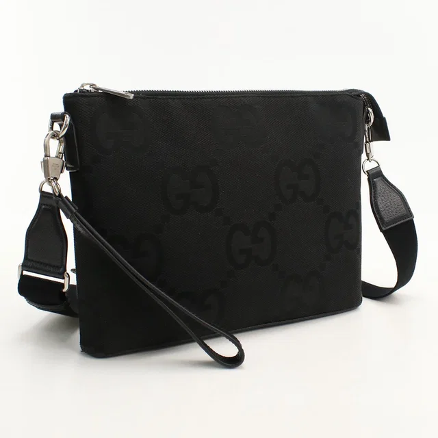 Gucci 2-Way Clutch Jumbo GG Shoulder Bag Canvas in Canvas from The Reluxe