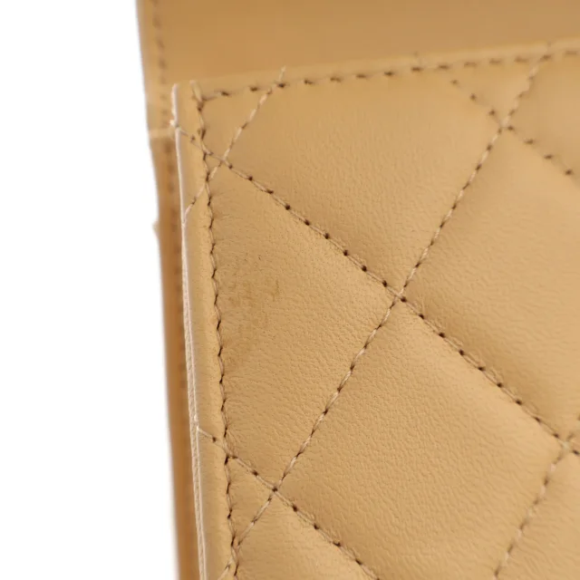 Beige Chanel CC Quilted Lambskin Faux Pearl Top Handle Flap Satchel in Beige Lambskin from Designer Revival, photo 9 of 14