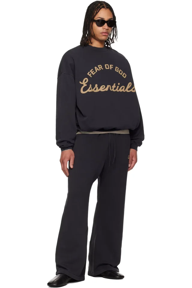 Fear of God ESSENTIALS Black Training Classic Flare Sweatpants, photo 4 of 4 from SSENSE