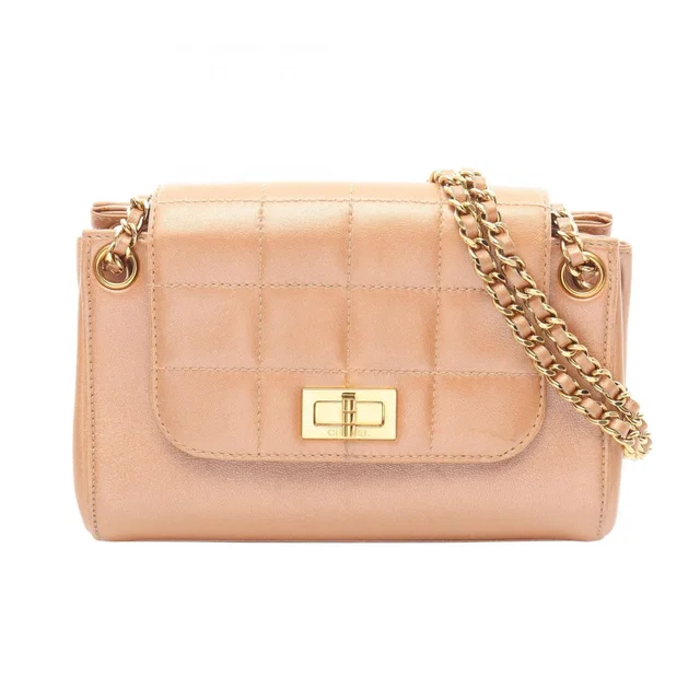 Chanel Shoulder Bag 2.55 Choco Bar Pink Gold Lambskin Small Flap Chain in Pink Lambskin from The Reluxe