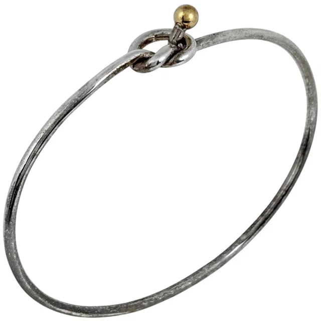 Tiffany & Co. Hook Eye Bangle Love Knot Bracelet from The Reluxe