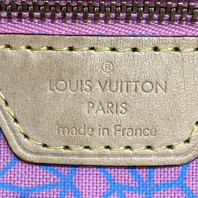 Louis Vuitton Neverfull Monogram Tote Limited in Brown Canvas from LuxUness, photo 4 of 9