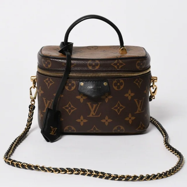 Louis Vuitton Vanity Chain Pouch Monogram Reverse Brown Gold in Brown Leather from The Reluxe